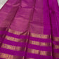 vasantham  Fuchsia pink – Handwoven Kanchipuram Silk Saree A poem in Fuchsia silk. The body glows in a serene vibrant Fuchsia, softly accented by delicate gold vertical lines and dainty gold zari buttas that glint like little blessings.