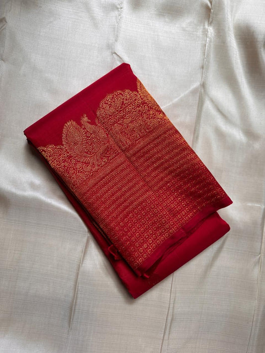 Svaroopam Red
Kumkum-Red Kanchipuram Silk Saree
Zari-Woven Peacock Procession Heirloom