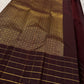 Poornima Kalyani
Kungumam Red & Cocoa Kanchipuram Silk Saree
Zari Buttas · Grid Borders · Silk Mark Certified
