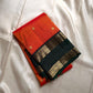 Riya – Orange Silk Saree with Dark Green Zari Border
Radiating warmth and festive charm, Riya  glows in a rich ombré of orange and vermilion, adorned with dainty gold butta motifs that shimmer gently with movement.