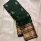 Emerald Green Elephant Butta — Pure Kanchipuram Silk Saree
Emerald green body with antique-gold zari elephant buttas and grand coffee-brown korvai borders featuring yali–mayil motifs.
Silk Mark Certified • Blouse Stitching Available ($30) • Free Shipping