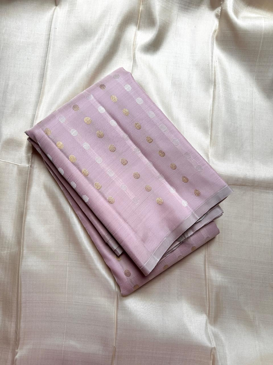 The daintiest blush pink with zari coin buttas in gold and silver pure silk Kanchipuram saree