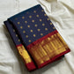 Midnight Neelam Flower Butta — Kanchipuram Pure Silk


Deep midnight neelam (navy) body with scattered gold flower buttas

Korvai contrast maroon borders with grand + geometric zAri motifs 

Rich zari pallū with ornamental motifs; hand-twisted tassels