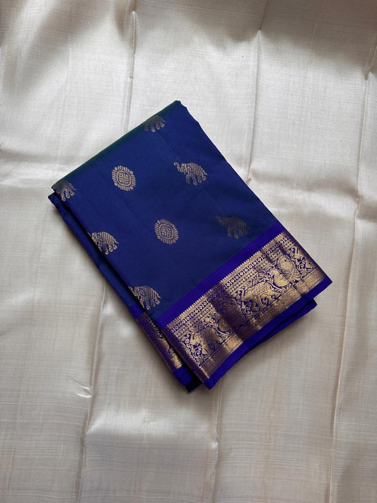Neelam Light Weight – Budget Kanchipuram Silk Saree
Peacock-blue body with gold zari gaja & medallion buttas
Royal blue border with peacock & floral zari detailing
Ships in two weeks
Silk Mark Certified | Fall & Pico Done