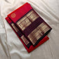 Vivid red  shot deep pink with coffee brown Mayil Kamalam rettapettu border and butta paisley Zari woven butta on body pure silk Kanchipuram saree