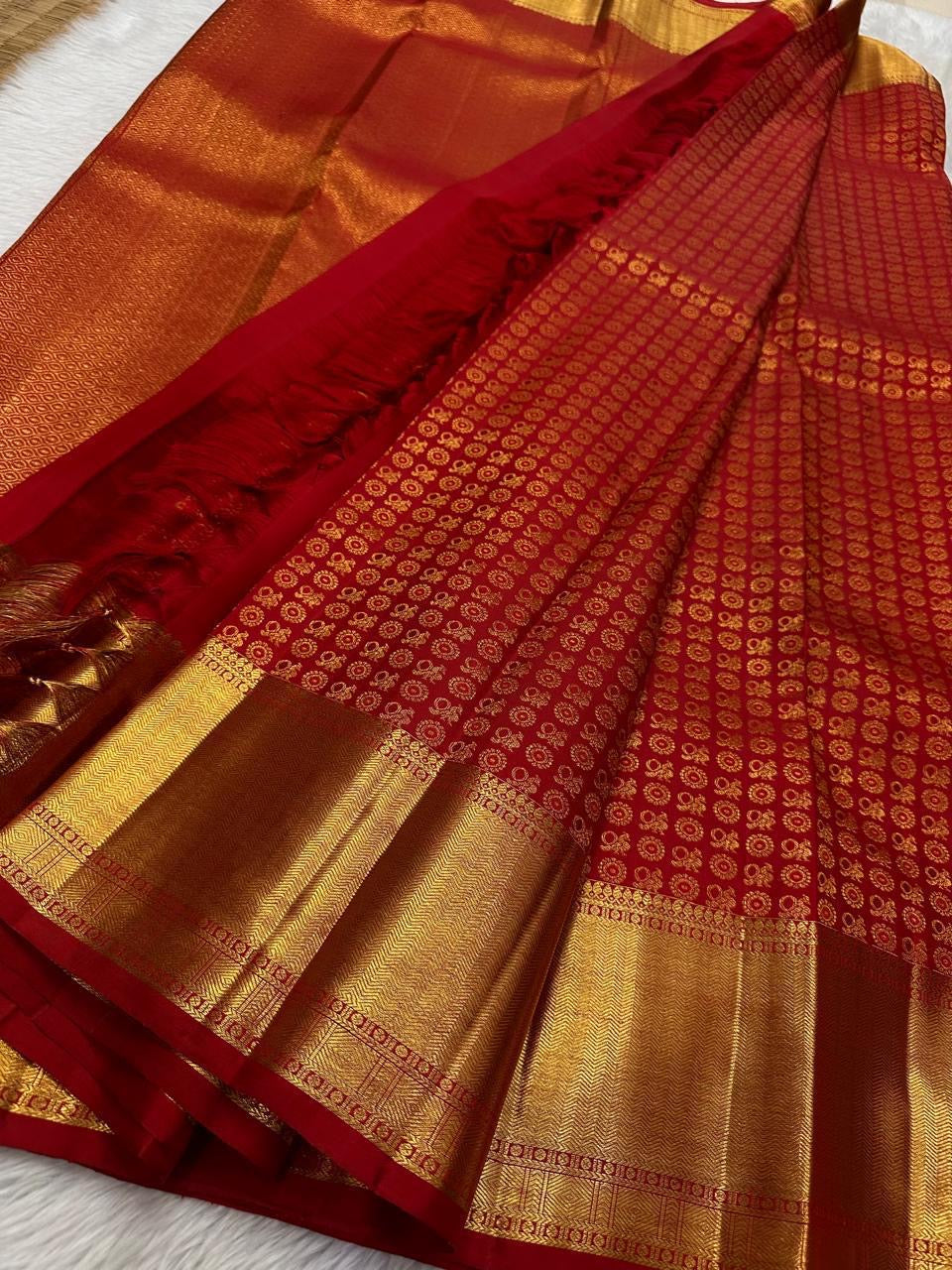 Tara – Red Kanchipuram Pure Silk Saree ✨
Woven with Pure 3G Zari buttas Throughout
Deep Roja-Red Body with Golden Zari Buttas
Broad 3G Zari Border with Traditional Weave
Silk Mark Certified | Free USA Shipping