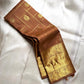 Bronze Chakram — Kanchipuram Pure Silk

Warm caramel-brown body with grid checks & “chakram” buttas

Grand gold zari peacock border & glowing pallu (kaddi + paisley vine)

Silk Mark Certified | Free Shipping within USA

Dispatch in 1 Week