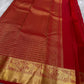 Dia ✨ – Chilli Red Pure Kanchipuram Silk Saree
Allover Gold Zari Floral Buttas on Body
Broad Elephant–Peacock (Gaja–Mayil) Zari Panel Border
Rich Red & Gold Brocade Pallu with Intricate Weaves
Silk Mark Certified | Fall & Pico Done | Blouse Stitching $30