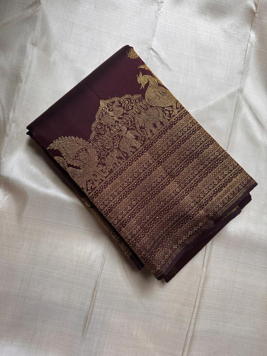 Svaroopam Brown
Temple Procession Kanchipuram Silk Saree
Antique Gold Zari-Woven Heritage Heirloom