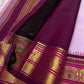 Lavanya Varnam — Pure Silk Kanchipuram Saree
Soft lavender-lilac body with rose-gold paisley buttas and deep wine-maroon korvai borders woven with temple motifs and rich zari.
Silk Mark Certified • Blouse Stitching Available ($30) • Free USA Shipping •