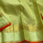 Meadow Shine — Kanchipuram Pure Silk Saree

Pastel meadow-green body with micro kattam checks & zari buttas

Antique zari borders woven with vine & elephant motifs

Warm kesari-orange selvedge a radiant edge . Silk mark cert￼. Free shipping within USA