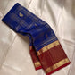 Sapphire Ruby Kattam – Pure Kanchipuram Silk Saree
sapphire blue body with gold kattam checks & buttas
Contrast ruby-red korvai borders with intricate gold zari weave
Grand ruby-red pallu with floral motifs
Silk Mark Certified | ships in 2 weeks