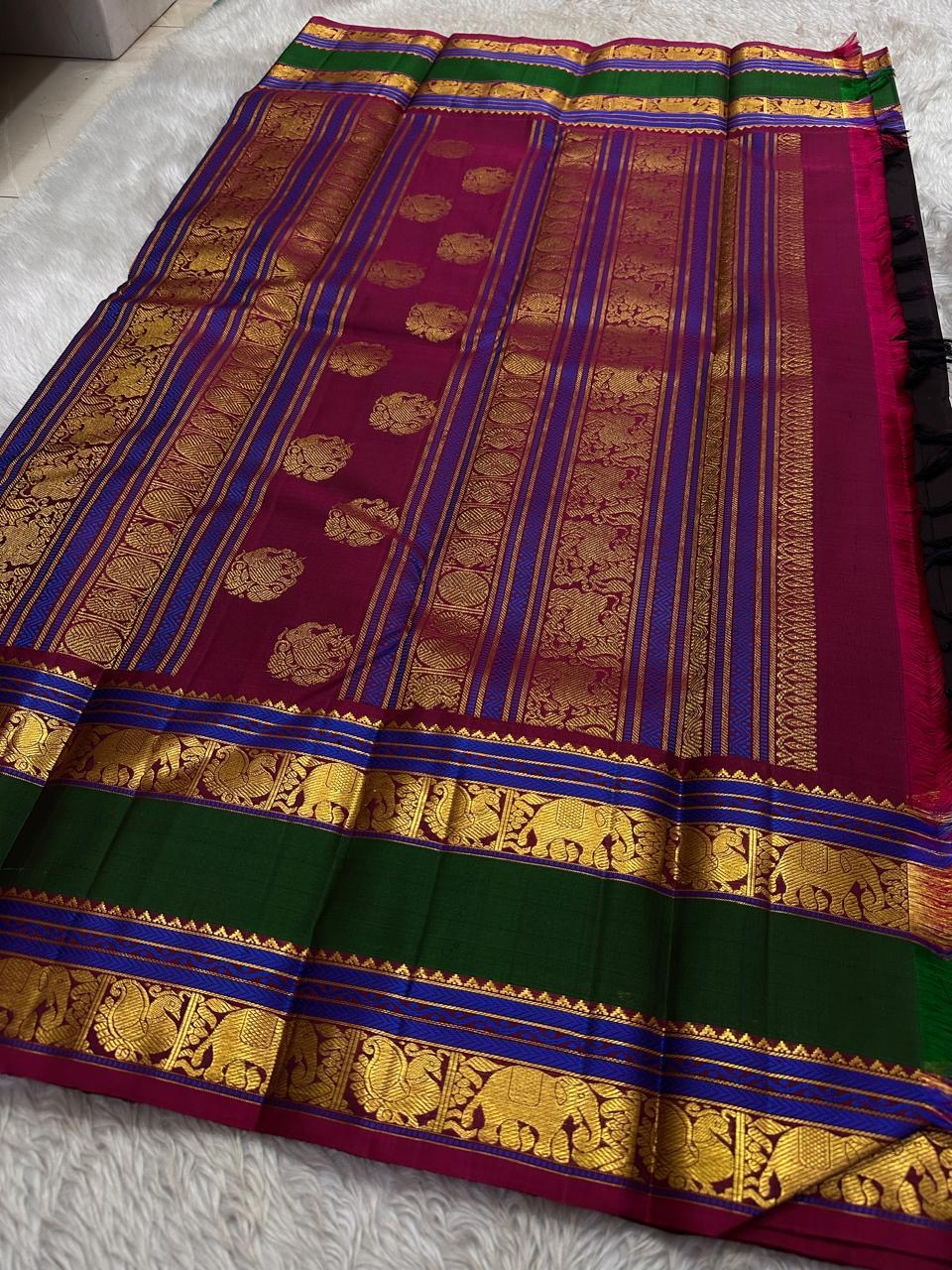 Mahathi Kanjivaram — Black Silk with Elephant Zari Borders
Deep Black Body • Green & Maroon Contrast • Blue Temple Highlights
Silk Mark Certified • Free Shipping within USA • Ships in Two Weeks