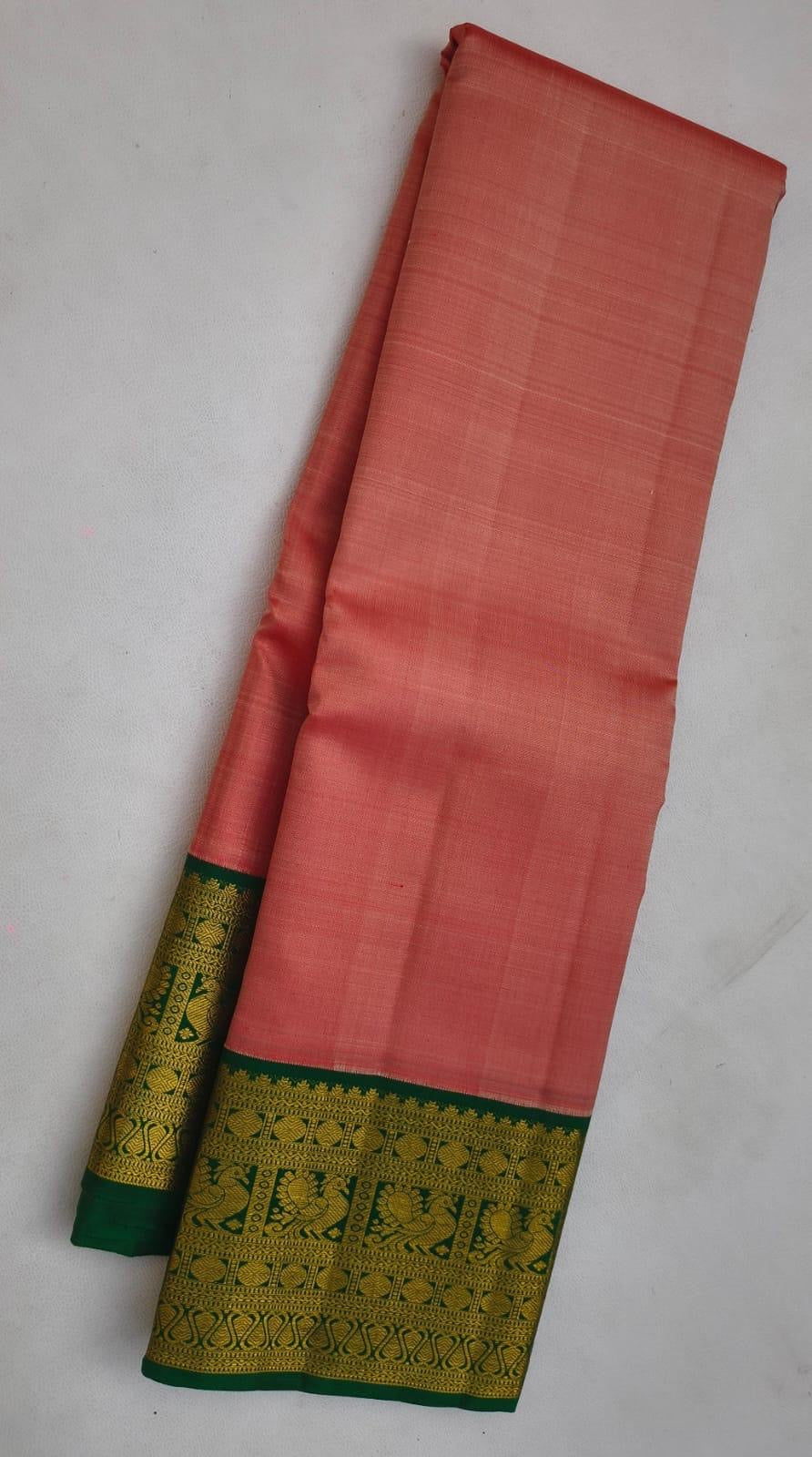 Coral Peach Pink and Emerald Green Handwoven Pure Silk Kanchipuram Saree with Korvai Border