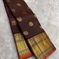 Close view of Mayil Chakram Butta motifs on deep brown Kanchipuram silk saree