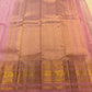 Blush pink Kanchipuram silk saree body with traditional gold zari buttas