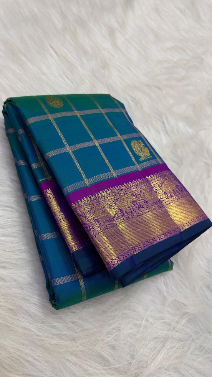 Peacock Blue pure silk Kanchipuram saree, Zari Kattam weave with Purple border — full drape view