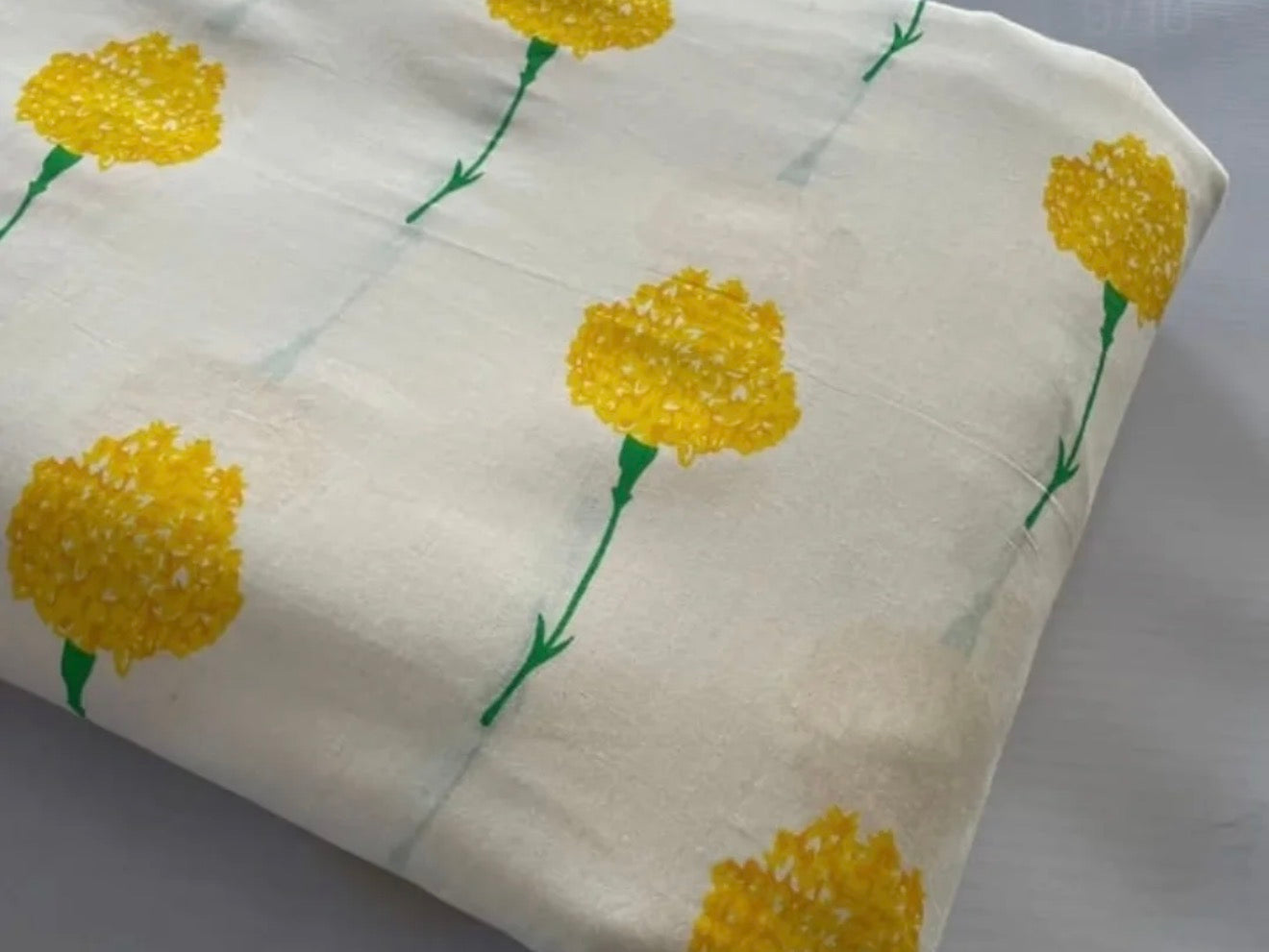 Ivory cotton blouse with mustard floral handblock print and artisan Ajrakh sleeve detailing