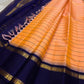 Peach Veldhari ✨ – Pure Kanchipuram Silk Saree with Royal Blue Border & Pallu

Peach-Orange Veldhari Striped Body with Subtle Green & Maroon Accents

Royal Blue Korvai Border with Intricate Gold Zari Motifs

Majestic Royal Blue Zari Brocade Pallu