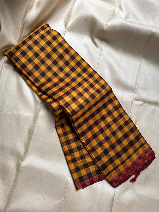 Kanchi kattam mustard and brown checked saree with deep maroon Pallu, Kai korvai