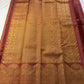 Rust Orange Elephant Peacock Arches – Pure Silk Kanchipuram Saree
Tiny gold podi butta motifs with grand elephant & peacock arch borders
Rich antique-gold zari pallu with floral columns & temple designs
Silk Mark Certified | Free Shipping within USA-