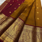 Pure silk Kanchivaram saree with legendary double-headed bird motif woven in luminous antique gold zari