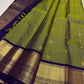 Deep royal purple zari border with floral vine detailing on olive green Kancheepuram Vairaoosi saree