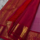 Banu – Off-White Kanchipuram Pure Silk Saree with pure 3gm Zari Kattam & Deep Red-Pink Shot color Border with elegant and peacock motifs
