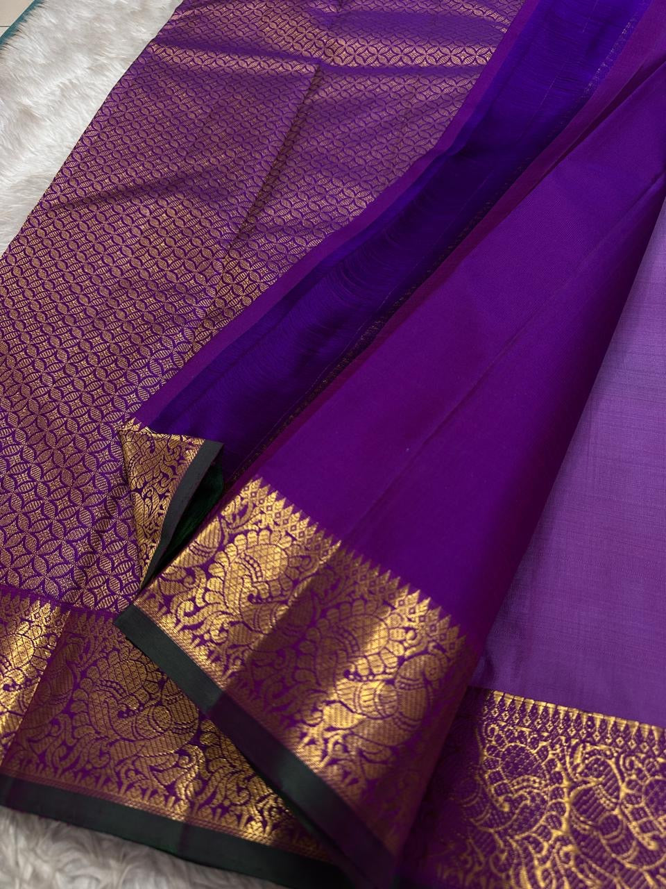 Amethyst Lustre Purple
Pure Kanchipuram Handloom Silk Saree
Golden Zari Peacocks • Heirloom Grandeur