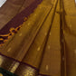 Amber Oosikattam ✨ – Pure Kanchipuram Silk Saree
Burnished Amber-Gold Body in Oosi Zari Kattam with Leaf Buttas
Deep Maroon Korvai Border with Green Selvedge & Elephant Motifs
Regal Maroon Pallu with Intricate Gold Zari Brocade
Silk Mark Certified |