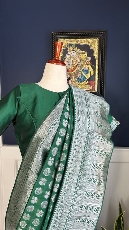 Green silver and gold Saree with peacock motif embroidery embellished with temple jewelry style stone work