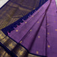 Lilac Mayil Pushpam – lilac-purple body with navy korvai borders

Pure Kanchipuram silk • gold zari pushpam (flower) buttas all over

Grand navy brocade pallu with diamond jaal • contrast blouse with border

Silk Mark Certified | Fall & Pico Done |