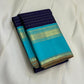 Indigo Teal Kattam – Pure Silk Kanchipuram Saree
Deep Indigo Body with zari Kattam Checks
Teal Contrast Korvai Border with maanga pet and mayil kann border, maanthulir selvedge  , silk mark certified -ships in two weeks