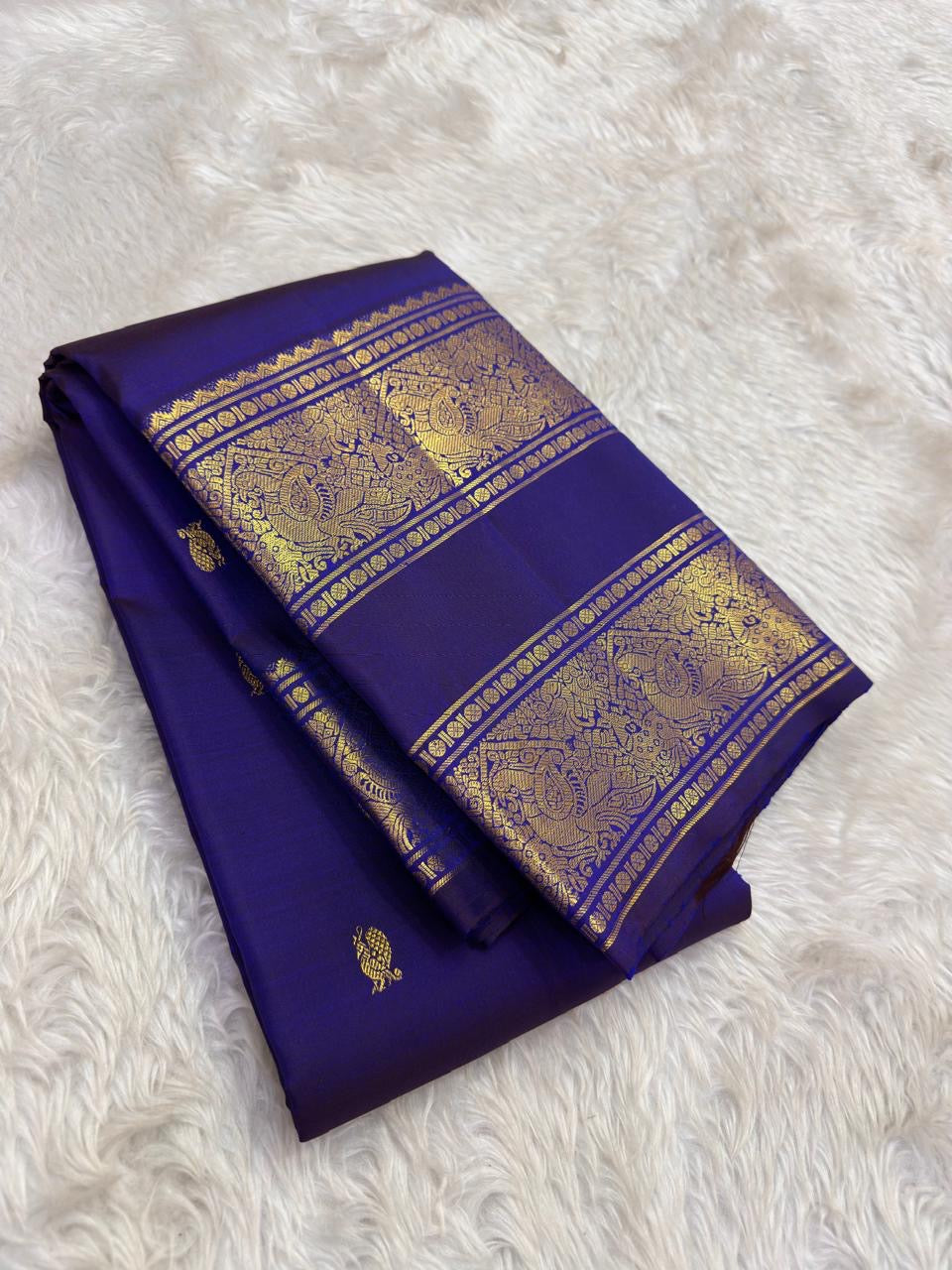 Royal Indigo and Antique Gold Handwoven Pure Silk Kanjeevaram Saree with Rettapet Border and Mayil Chakram Butta