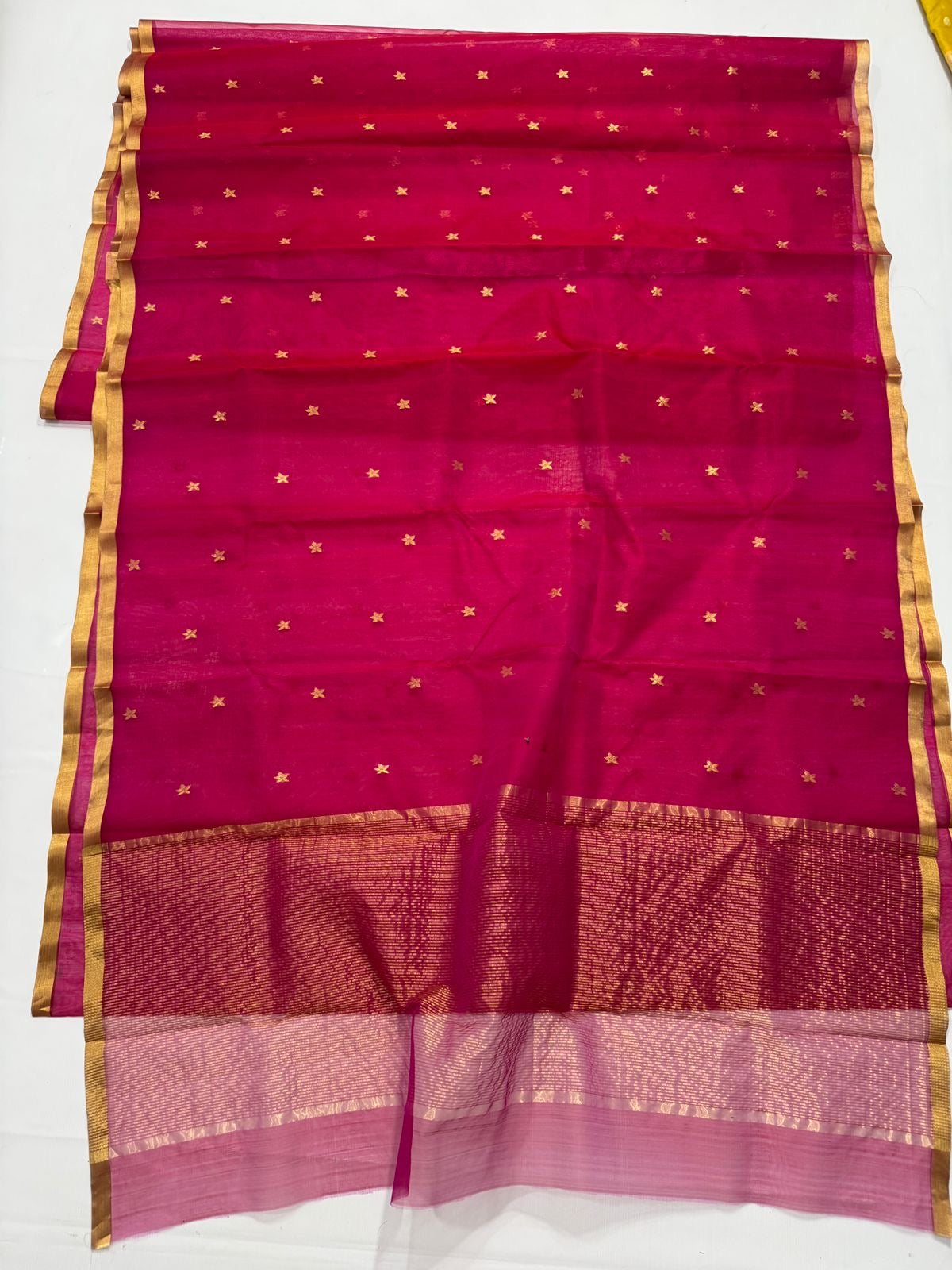 Pure Chanderi Silk by Katan – Rani Pink with Gold Buttas & Rose-Pink Tissue Pallu
Handwoven rani silk with tiny gold buttas, gold kaddi border & shimmering rose-pink tissue pallu ✨
Silk Mark Certified • Free Shipping within USA • Ships in Two Weeks