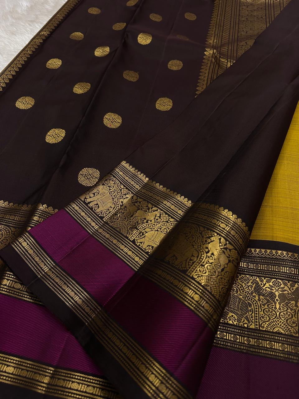 Manjal Jamuna – Pure Kanchipuram Silk Saree
Turmeric glow, softly lit in silk.
Ashwa buttas dance across the body.
Jamuna korvai with regal deer butta .

Silk Mark Certified, delivery in 2 weeks
