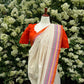 Tamara – Ivory Cream Semi-Silk Saree with Vibrant Orange Border
Paired with a Scallop Neck & Sleeve Ready-to-Wear Orange Blouse (Size 36–42)