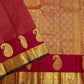 Ushas, Deep Arakku Red Pure Kanchipuram Silk Saree
Radiant Oosi Kattam body with ornate Paisley 2gm Zari
Vanasringaram,Muthuseer,Kamalam border with Fishpettu detailing
Exquisite diamond-pet grid Zari pallu, richly finished with a bold deep green selvedge