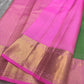 Asha ✨ – Fresh Green Pure Silk Kanchipuram Saree
with Radiant Pink Korvai Contrast Border
Gold Zari Floral Medallion Buttas on the Body
Grand Pink Brocade Pallu with Intricate Weaving