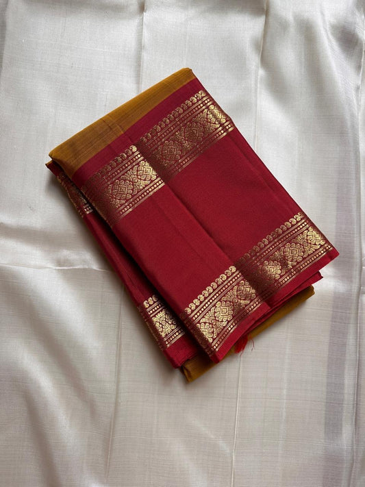 Ponvandu Kumkumam – Pure Kanchipuram Silk Saree
Honey-Gold Body with Zari Buttas
Contrasting Kumkum Red Borders with Floral Zari
Grand Kumkum Red Pallu with Zari Kaddi & Brocade
Silk Mark , | ships in 2 weeks, fall pico | Blouse Stitching Available |