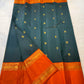 Divya – Handwoven Black Kanchipuram Pure Silk Saree with Mayil & Floral Butta, Finished with a Bold Rettapettu Border