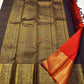 Mathura Layam — Pure Silk Kanchipuram Saree
Deep espresso brown with gold varisaipet checks & peacock zari border
Vermilion red vaira-kattam pallu | Silk Mark Certified | Ships in 2 Weeks | Free USA Shipping