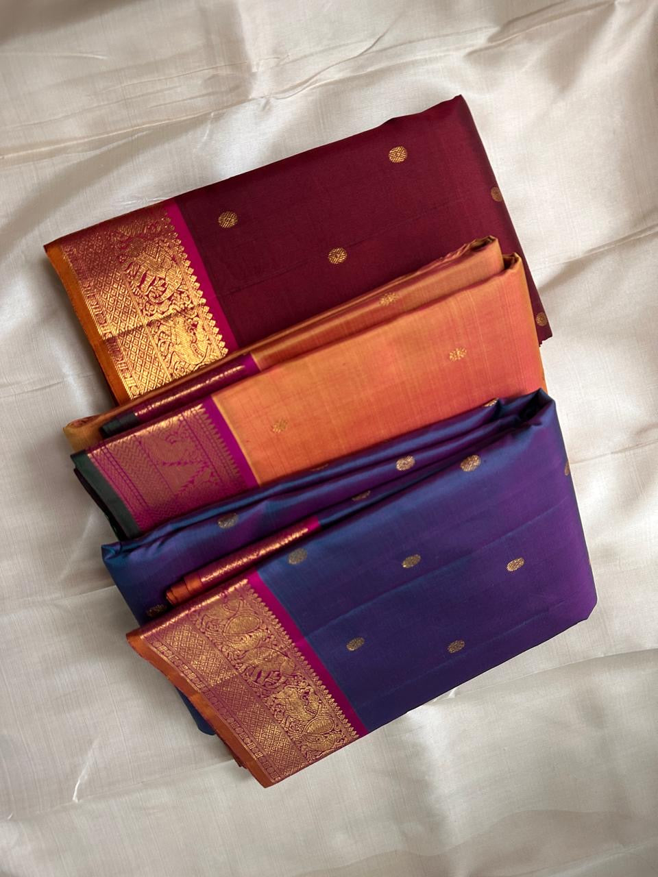 Lotus Crest Blue — Pure Kanchipuram Silk Saree Peacock–blue body with gold buttas & magenta elephant zari-woven borders Silk Mark Certified • Free Shipping within USA • Ships in Two Weeks