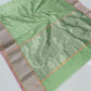 Anaya – Earthy Green Silk Chanderi Saree with Pink Contrast Border & Full Zari Pallu
A refreshing earthy green Silk Chanderi saree that drapes like a dream.
Adorned with fine gold and silver zari work across the body.