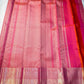 Peach Pink Flower Butta – Coral-pink shot body with micro checks & floral buttas

Handwoven Kanchipuram silk with delicate copper-pink zari work

Elegant floral vines on borders • grand rose-gold brocade pallu

Silk Mark Certified | Fall & Pico Done |