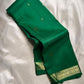 Small Border Pachai | Pure Kanchipuram Silk Saree
Temple green elegance with petite zari buttas & fine korvai border ✨
Silk Mark Certified • Free USA Shipping • Ships in Two Weeks