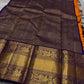 This Maambazha yellow Kanchipuram silk saree features zari mayil buttas and a deep blue rettapet border with kamalam motifs — a timeless blend of tradition and grace.