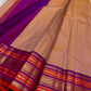 Valli – Handwoven Terracotta Blush Kanchipuram Silk Saree Featuring Intricate Mayil Butta and a Dual-Tone Varisaipet Border in Plum and Vermilion, Adorned with Temple-Inspired Zari motifs