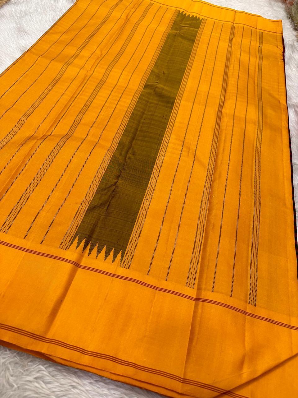 Paavai – Arakku Red & Brown Pattani Kattam Kanchipuram Pure Silk Saree with Mustard Border & Pillayar Moggu Motifs