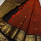 Rust Orange Prabhavali – Pure Silk Kanchipuram
Rust-orange body with golden zari buttas ✨
Deep black korvai borders with grand Annam medallions 🪔
Opulent black brocade pallu with diamond jaal & tassels 🌿
Silk Mark Certified • Ships in Two Weeks • Free S